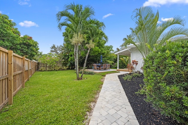1567 NE Sottong Ave, Jensen Beach, FL 34957 - view of yard featuring a patio