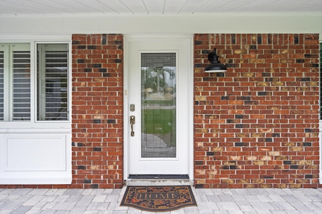 1567 NE Sottong Ave, Jensen Beach, FL 34957 - view of exterior entry with brick siding