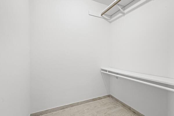 1830 Well Rd, Fort Pierce, FL 34945 - spacious closet with light wood-type flooring