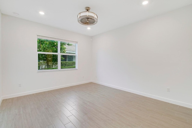 14556 Wiley Range Rd, Delray Beach, FL 33446 - unfurnished room featuring light wood-style flooring and recessed lighting