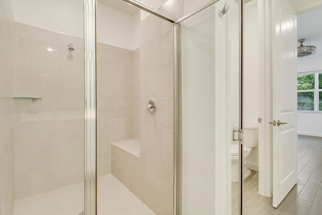14556 Wiley Range Rd, Delray Beach, FL 33446 - bathroom featuring toilet and a stall shower