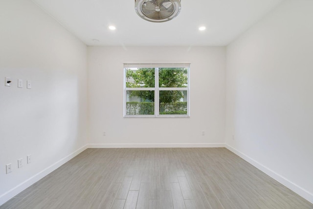 14556 Wiley Range Rd, Delray Beach, FL 33446 - unfurnished room featuring light wood-style floors and recessed lighting