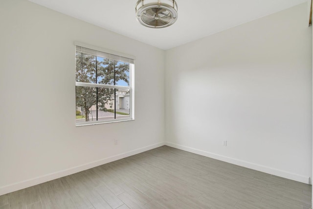 14556 Wiley Range Rd, Delray Beach, FL 33446 - empty room with baseboards and light wood-type flooring