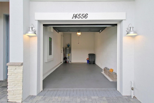 14556 Wiley Range Rd, Delray Beach, FL 33446 - garage featuring electric water heater