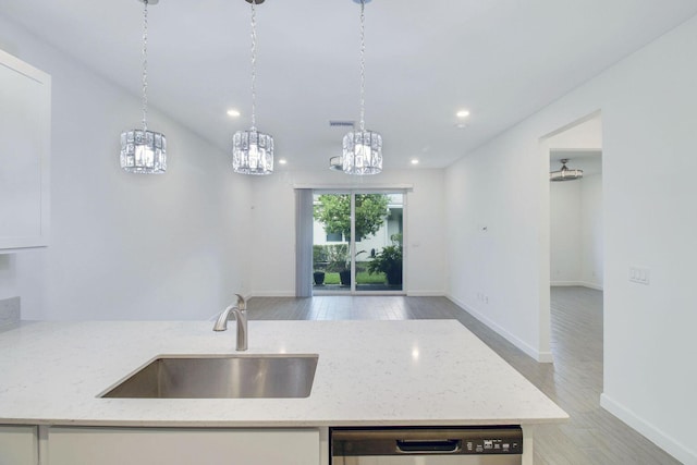 14556 Wiley Range Rd, Delray Beach, FL 33446 - kitchen featuring light stone countertops, stainless steel dishwasher, a chandelier, open floor plan, and recessed lighting