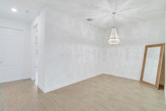 14556 Wiley Range Rd, Delray Beach, FL 33446 - unfurnished dining area featuring a chandelier and light wood-style floors