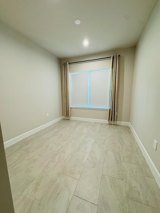 163 SW Pomeroy St, Stuart, FL 34997 - empty room featuring recessed lighting and baseboards