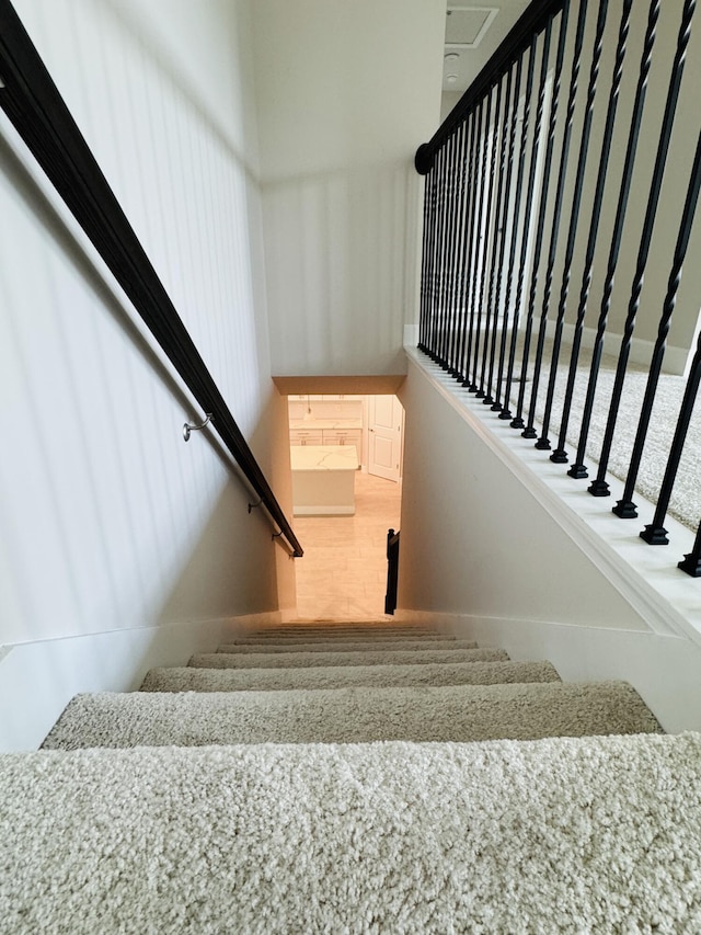 163 SW Pomeroy St, Stuart, FL 34997 - stairs with wood finished floors and baseboards