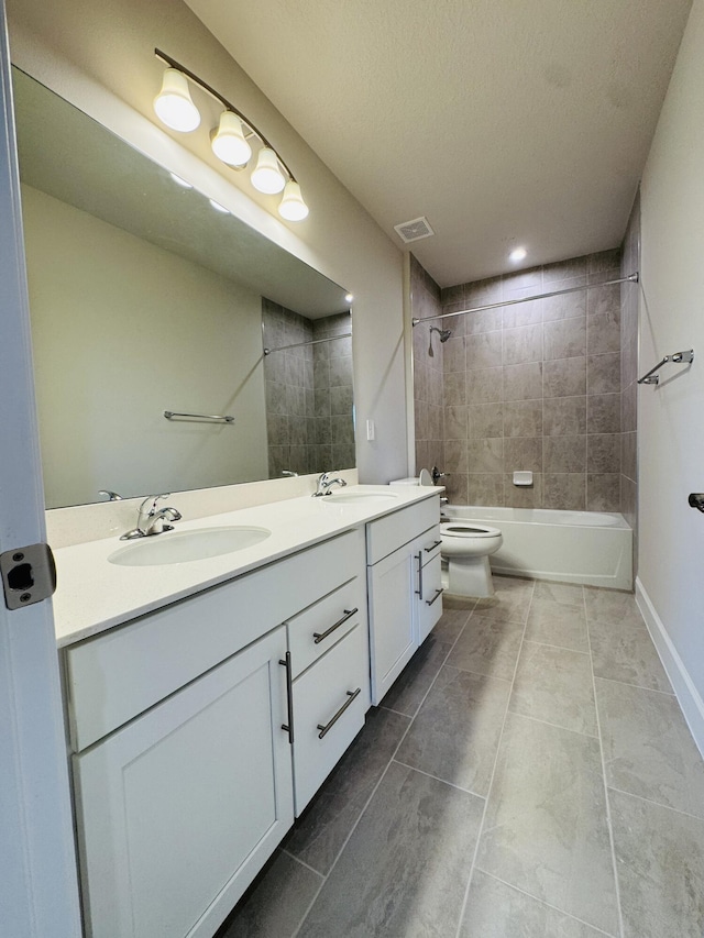 163 SW Pomeroy St, Stuart, FL 34997 - bathroom featuring double vanity, toilet, shower / tub combination, and tile patterned flooring