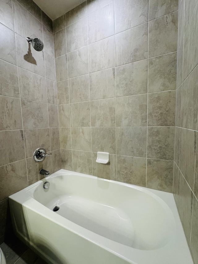 163 SW Pomeroy St, Stuart, FL 34997 - full bathroom featuring washtub / shower combination