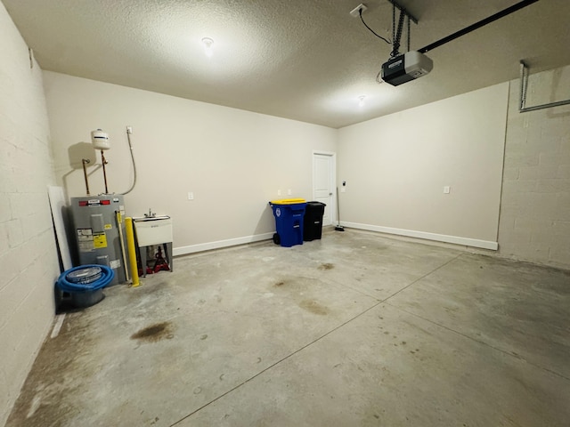 163 SW Pomeroy St, Stuart, FL 34997 - garage with electric water heater, a garage door opener, and concrete block wall