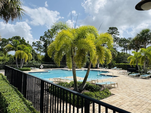163 SW Pomeroy St, Stuart, FL 34997 - community pool with a patio