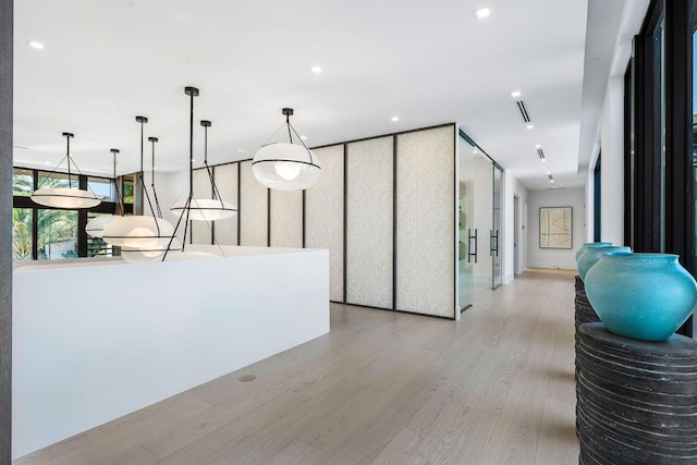 207 W Coconut Palm Rd, Boca Raton, FL 33432 - kitchen with light wood finished floors, pendant lighting, and recessed lighting