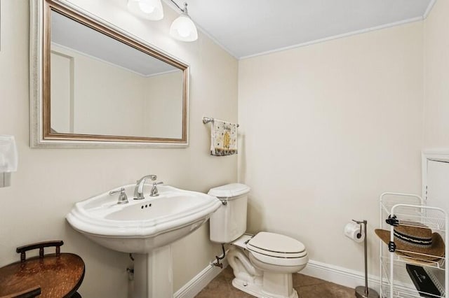 7 Atrium Cir Unit D, Atlantis, FL 33462 - half bath featuring tile patterned floors and ornamental molding