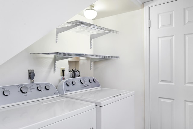 7 Atrium Cir Unit D, Atlantis, FL 33462 - washroom featuring independent washer and dryer