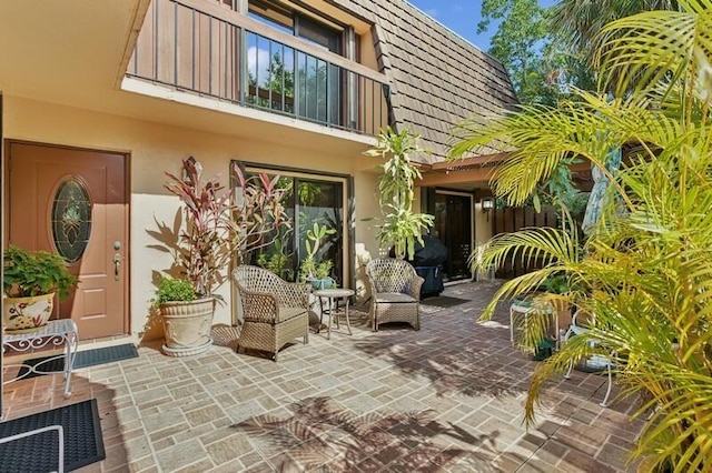 7 Atrium Cir Unit D, Atlantis, FL 33462 - patio / terrace with a patio