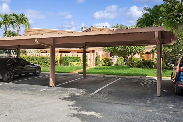7 Atrium Cir Unit D, Atlantis, FL 33462 - view of covered parking lot
