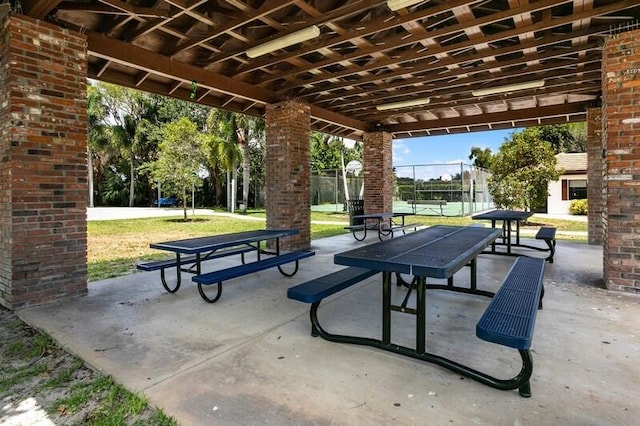 7 Atrium Cir Unit D, Atlantis, FL 33462 - view of property's community featuring a patio
