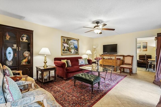 7 Atrium Cir Unit D, Atlantis, FL 33462 - living room with ceiling fan and a textured ceiling