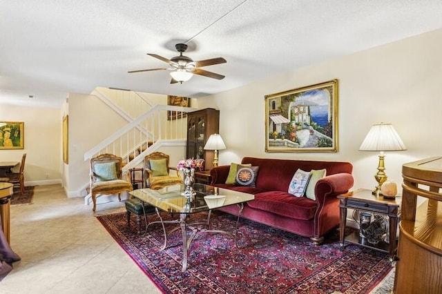 7 Atrium Cir Unit D, Atlantis, FL 33462 - living area with stairway, ceiling fan, tile patterned floors, and a textured ceiling