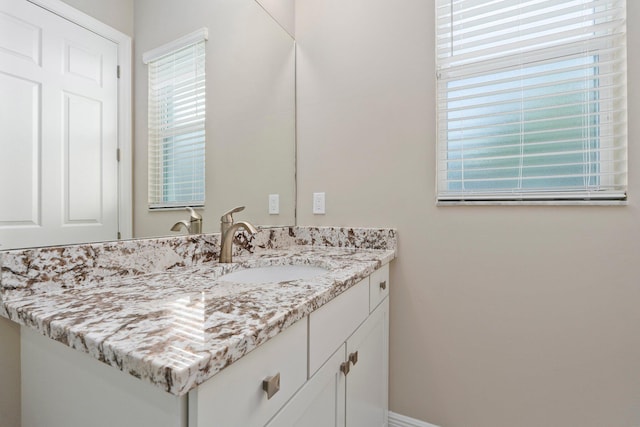 8650 SW Felicita Way, Port Saint Lucie, FL 34987 - bathroom featuring vanity
