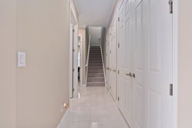 8650 SW Felicita Way, Port Saint Lucie, FL 34987 - hallway featuring light tile patterned floors and stairway