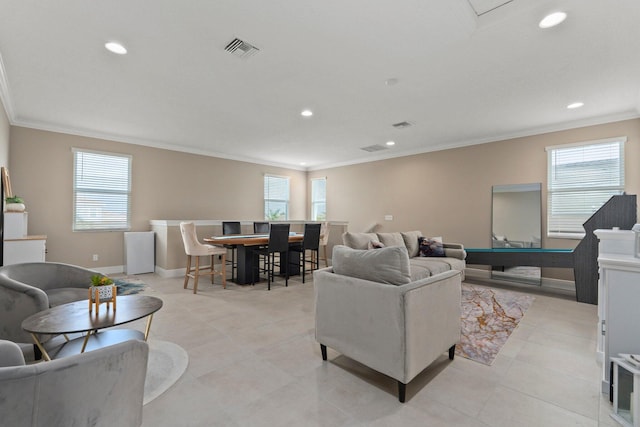 8650 SW Felicita Way, Port Saint Lucie, FL 34987 - living area with ornamental molding, recessed lighting, and light tile patterned floors