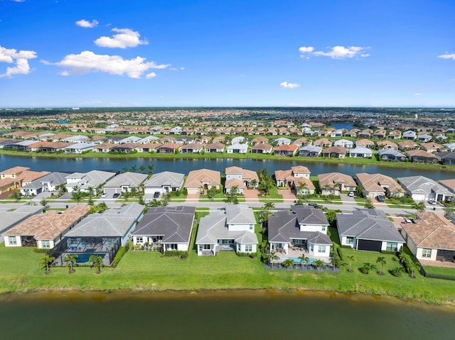 8650 SW Felicita Way, Port Saint Lucie, FL 34987 - aerial perspective of suburban area with a nearby body of water