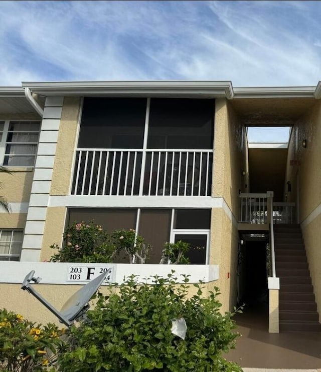 1534 SE Royal Green Cir Unit 103, Port Saint Lucie, FL 34952 - view of property featuring stairway