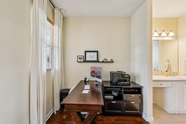 9425 SW Purple Martin Way, Stuart, FL 34997 - tiled home office with a sink