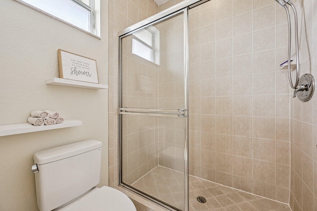 9425 SW Purple Martin Way, Stuart, FL 34997 - bathroom with toilet and a stall shower
