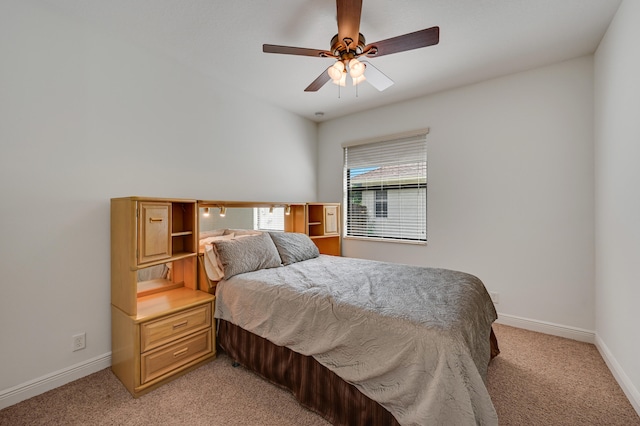5857 NW Leghorn Ave, Port Saint Lucie, FL 34986 - bedroom featuring light colored carpet and ceiling fan