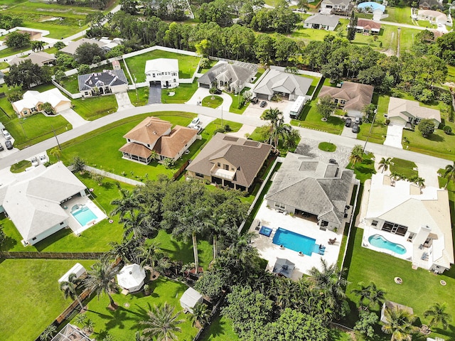 5857 NW Leghorn Ave, Port Saint Lucie, FL 34986 - aerial view of residential area with a pool