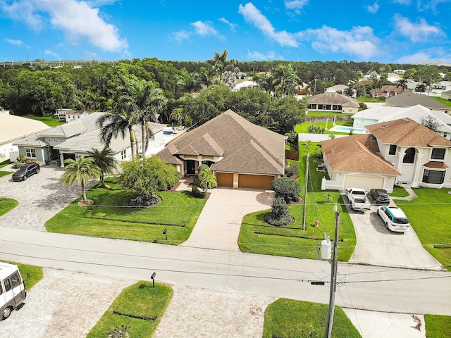 5857 NW Leghorn Ave, Port Saint Lucie, FL 34986 - aerial perspective of suburban area