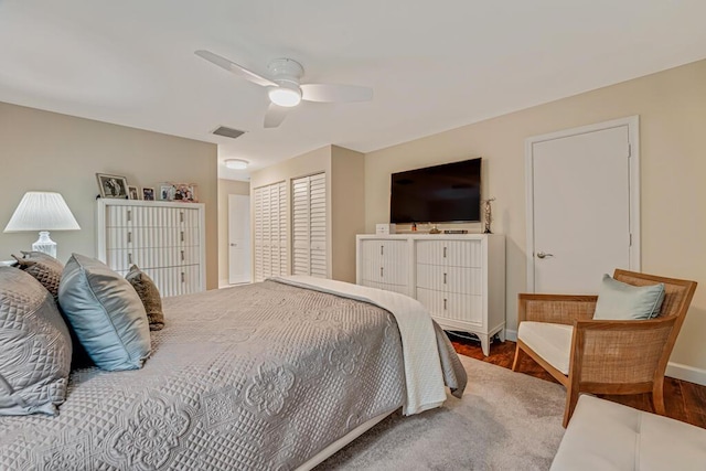 21290 Juego Cir Unit 12F, Boca Raton, FL 33433 - bedroom featuring wood finished floors and ceiling fan