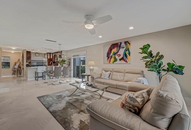 21290 Juego Cir Unit 12F, Boca Raton, FL 33433 - living area featuring a ceiling fan, light marble finish flooring, and recessed lighting