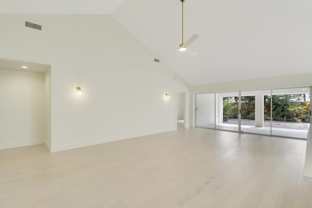 1365 Wilderness Rd, West Palm Beach, FL 33409 - unfurnished room with high vaulted ceiling and light wood-style floors