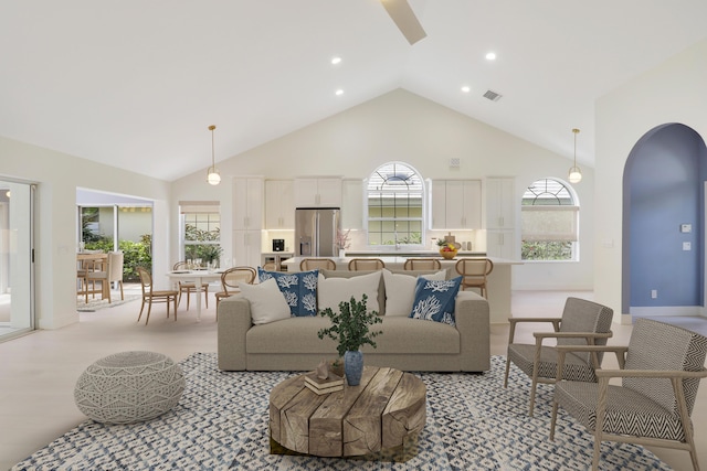 1365 Wilderness Rd, West Palm Beach, FL 33409 - living room with high vaulted ceiling, arched walkways, and recessed lighting
