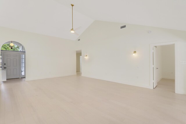 1365 Wilderness Rd, West Palm Beach, FL 33409 - spare room with high vaulted ceiling, light wood finished floors, and ceiling fan