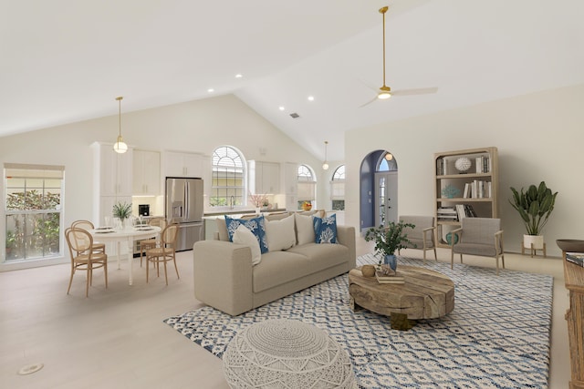 1365 Wilderness Rd, West Palm Beach, FL 33409 - living area with high vaulted ceiling, a ceiling fan, and recessed lighting