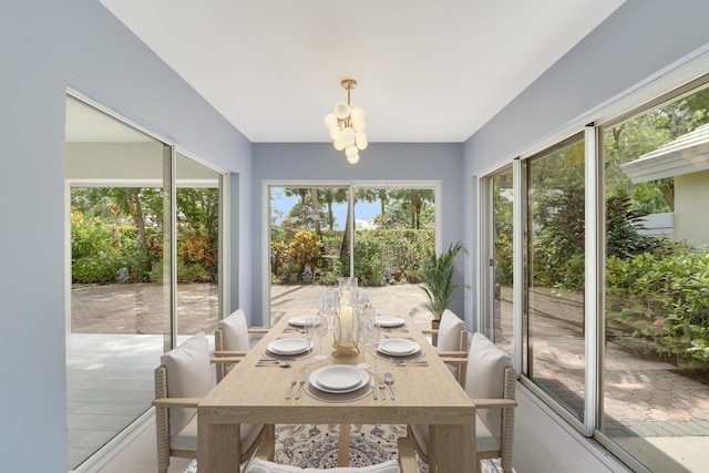 1365 Wilderness Rd, West Palm Beach, FL 33409 - sunroom / solarium with a chandelier