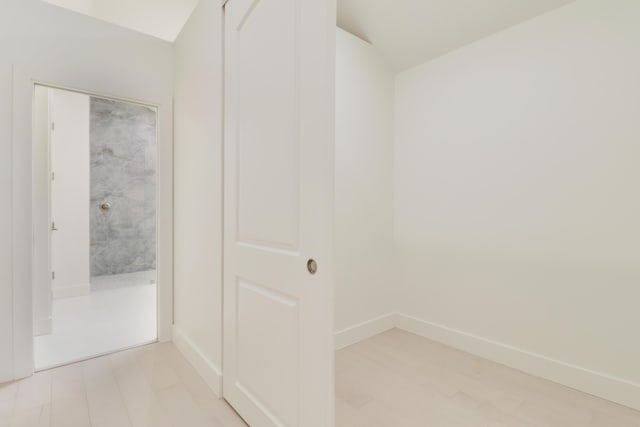 1365 Wilderness Rd, West Palm Beach, FL 33409 - spacious closet featuring lofted ceiling