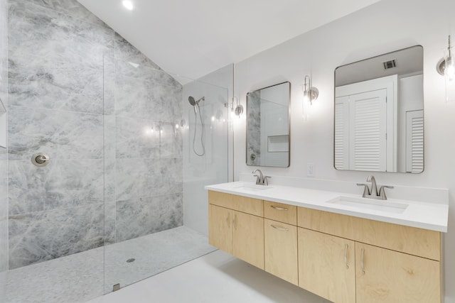 1365 Wilderness Rd, West Palm Beach, FL 33409 - bathroom with walk in shower, double vanity, and vaulted ceiling