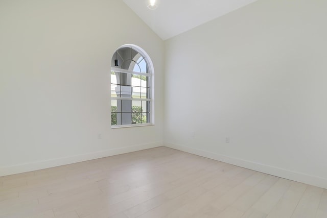 1365 Wilderness Rd, West Palm Beach, FL 33409 - unfurnished room featuring light wood-style floors and lofted ceiling