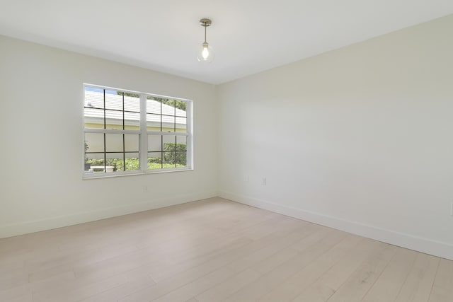 1365 Wilderness Rd, West Palm Beach, FL 33409 - unfurnished room featuring light wood finished floors
