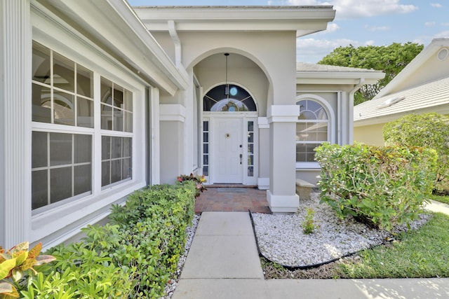 1365 Wilderness Rd, West Palm Beach, FL 33409 - entrance to property with stucco siding