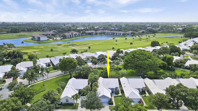 1365 Wilderness Rd, West Palm Beach, FL 33409 - aerial perspective of suburban area featuring a local golf course and a nearby body of water