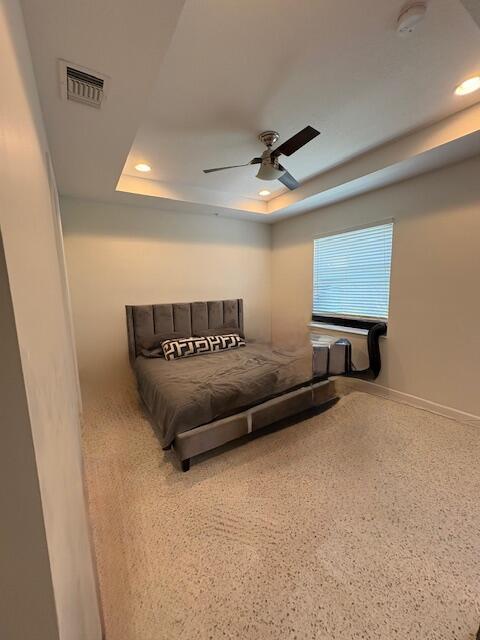 1377 Via De Pepi, Boynton Beach, FL 33426 - bedroom featuring a raised ceiling, recessed lighting, ceiling fan, and baseboards