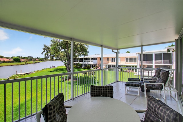 1320 NW 20th Ave Unit 202, Delray Beach, FL 33445 - sunroom / solarium featuring a water view and outdoor dining area