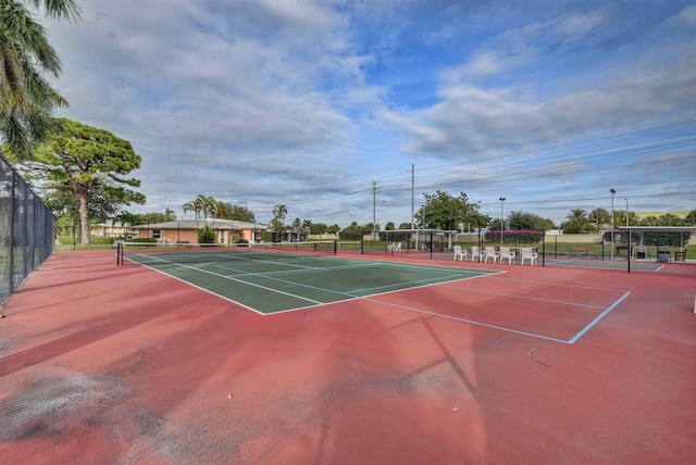1320 NW 20th Ave Unit 202, Delray Beach, FL 33445 - view of tennis court with community basketball court